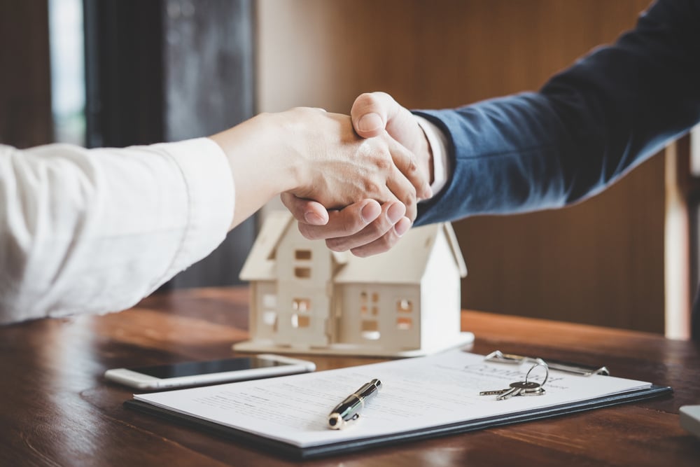 real estate hand shake deal